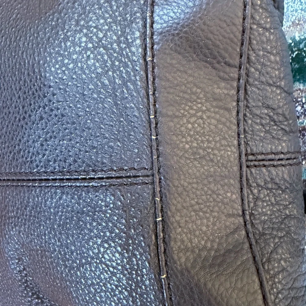 The Sak 2010’s “Deena Flap” Shoulder bag in chocolate brown